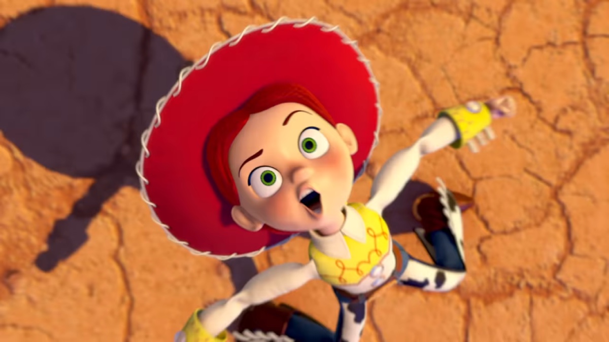 Jessie the Cowgirl character singing in the desert in the official Toy Story 5 music video by Taylor Swift.