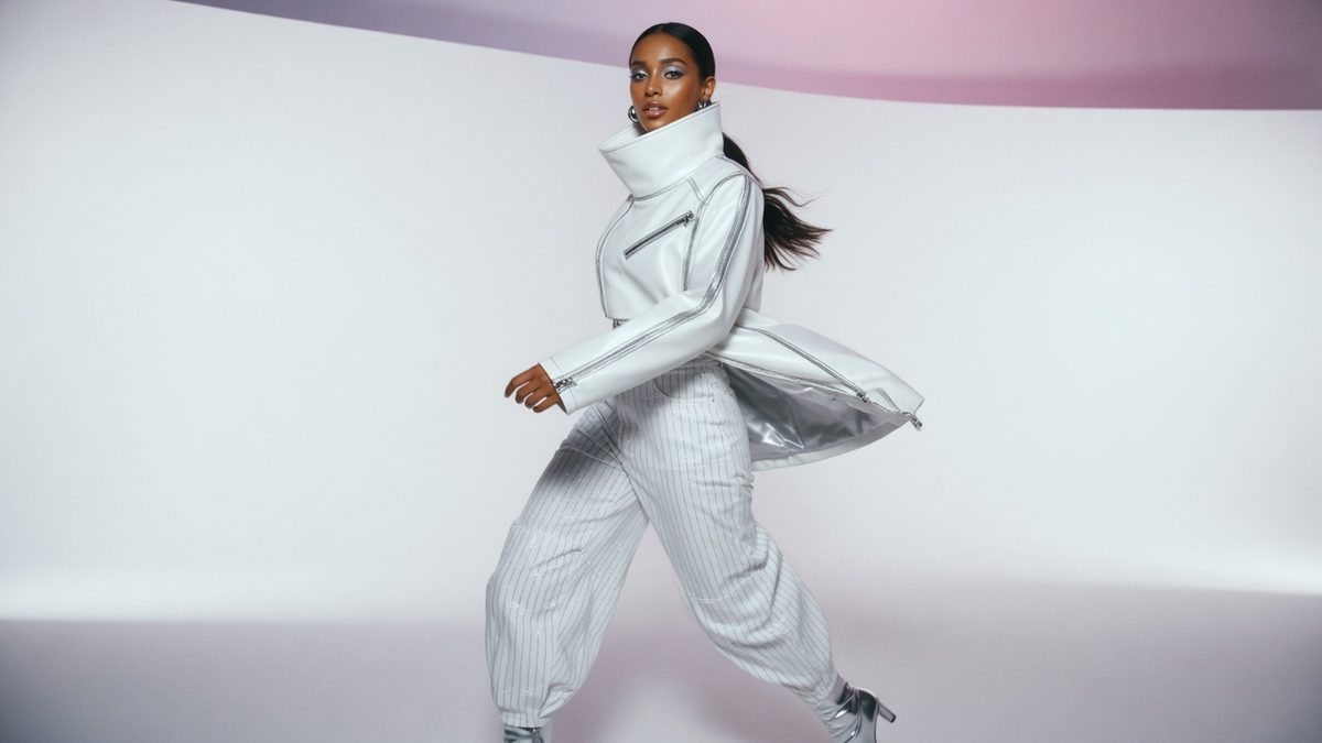 Khaki funnel-neck jacket paired with barrel-leg jeans, part of Zara's autumn 2026 high-street offer