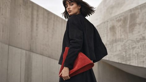 Suede jacket, mocha tones and a squishy east-west bag styled in a British autumn street setting