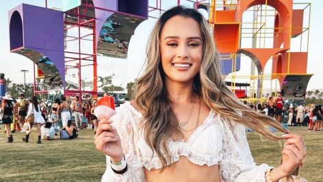 Boho chic white lace outfit at Coachella festival for festival style inspiration.
